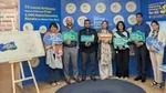 UBL employees interacting with campaign booth at head office