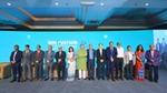 Group photo of representatives from Unilever and other stakeholder organisations on stage